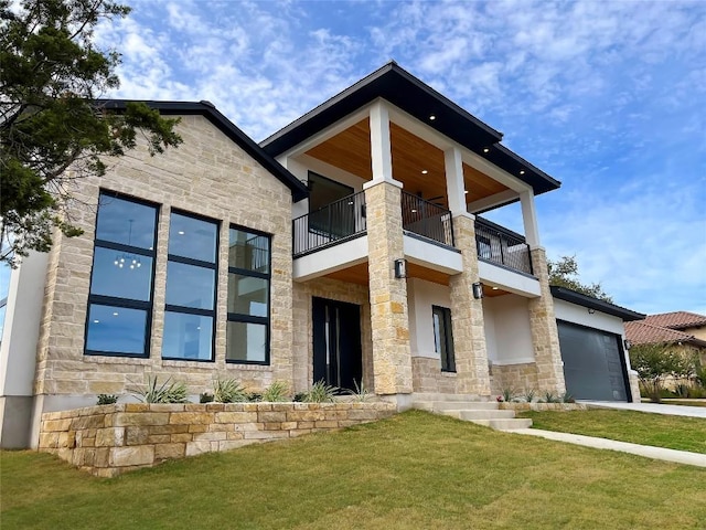 1020 Mountain Leather Dr, Horseshoe Bay, TX 78657 - contemporary house with a balcony, stone siding, a front yard, and a garage
