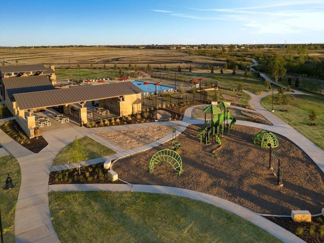 birds eye view of property featuring a rural view