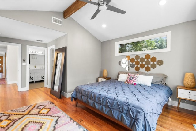 bedroom featuring wood-type flooring, vaulted ceiling with beams, and ceiling fan