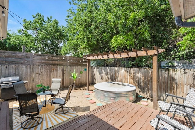 wooden terrace with area for grilling