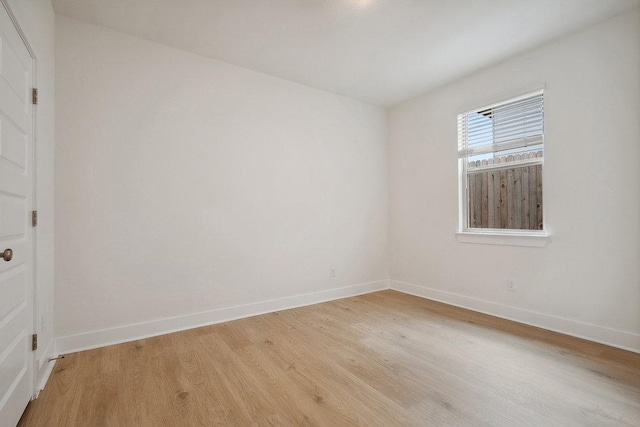137 Tenny Ln, Kyle, TX 78640 - unfurnished room with light wood-type flooring and baseboards