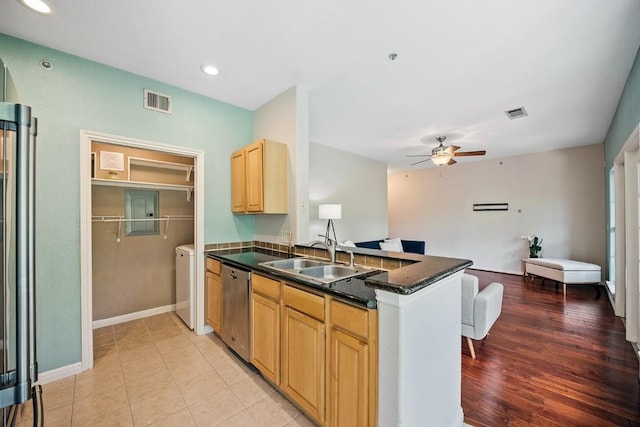 kitchen with ceiling fan, kitchen peninsula, sink, and dishwasher