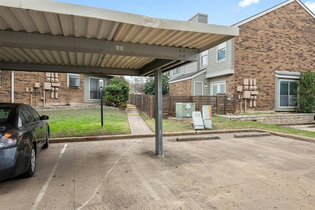 view of vehicle parking featuring a carport