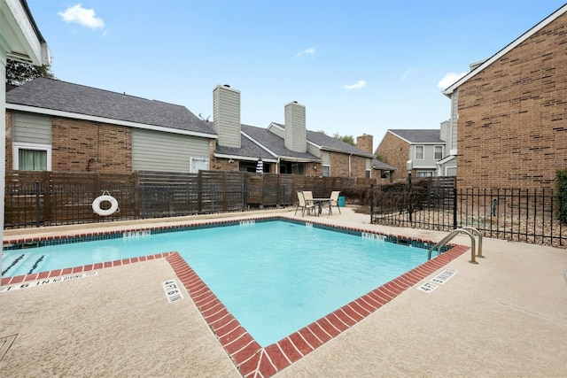 2018 W Rundberg Ln Unit 9D, Austin, TX 78758 - community pool with a patio area