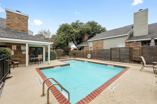 2018 W Rundberg Ln Unit 9D, Austin, TX 78758 - community pool featuring a patio area