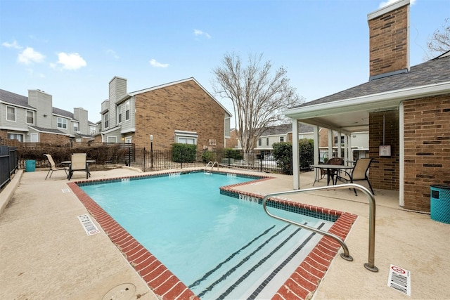 2018 W Rundberg Ln Unit 9D, Austin, TX 78758 - community pool with a patio area and a residential view