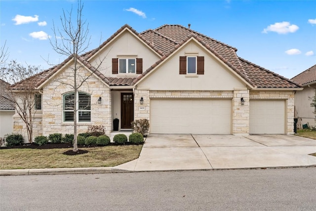 view of front of home with a garage