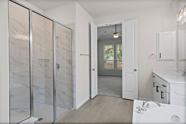 337 Five Mile Creek Way, Kyle, TX 78640 - bathroom featuring a marble finish shower, a ceiling fan, vanity, baseboards, and a bath