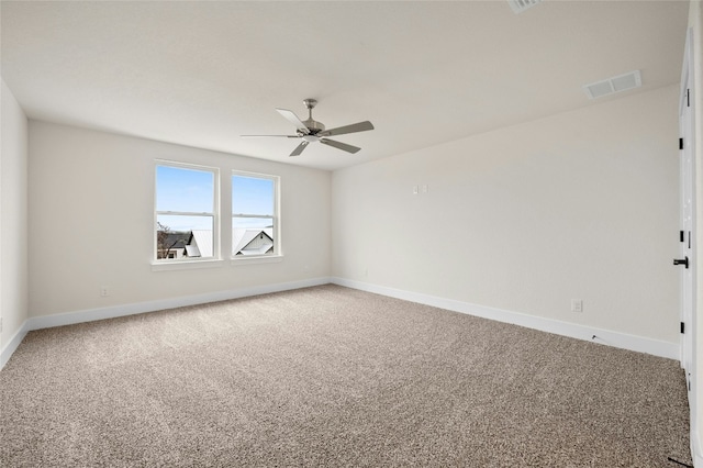 empty room featuring ceiling fan and carpet flooring