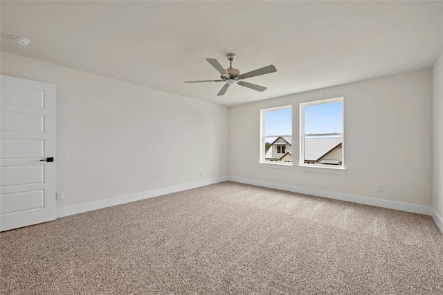 unfurnished room featuring carpet flooring and ceiling fan