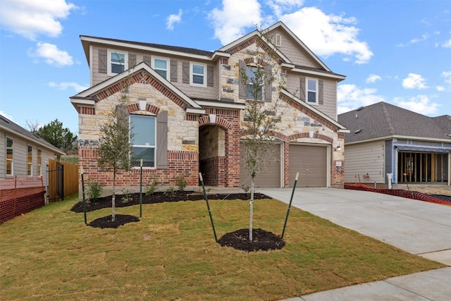 view of front facade featuring a garage and a front yard