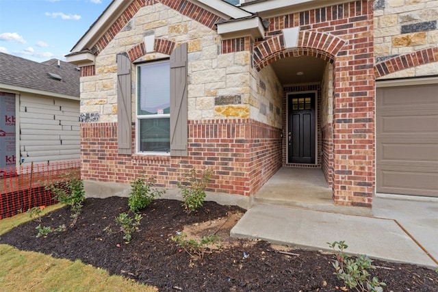 property entrance featuring a garage