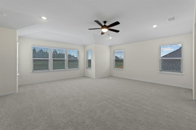 spare room with light carpet and ceiling fan