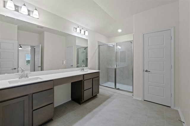 bathroom featuring tile patterned flooring, vanity, ceiling fan, and a shower with shower door