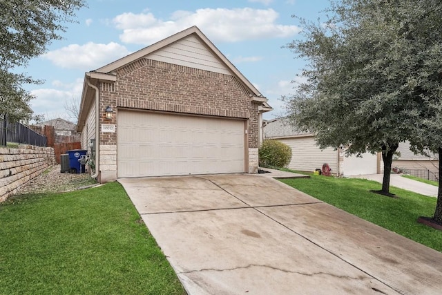 10017 Pinnacle Crest Loop, Austin, TX 78747 - view of side of property with brick siding, a garage, an outbuilding, and stone siding