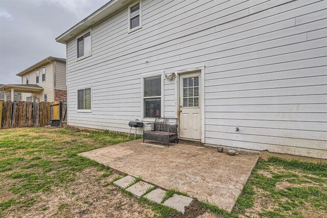 12828 Starbrimson Trl, Elgin, TX 78621 - rear view of property with a patio