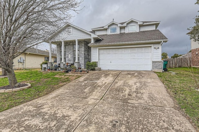 12828 Starbrimson Trl, Elgin, TX 78621 - view of front facade with driveway, a porch, and brick siding