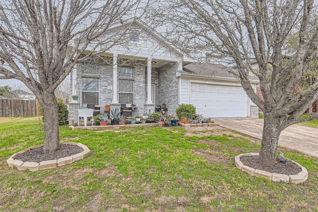 12828 Starbrimson Trl, Elgin, TX 78621 - view of front of property featuring concrete driveway, a garage, and brick siding