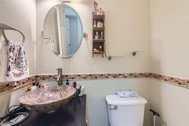 12828 Starbrimson Trl, Elgin, TX 78621 - half bathroom featuring toilet and a sink
