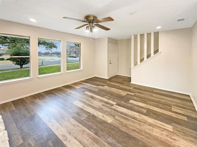 6234 Hillston Dr, Austin, TX 78745 - spare room featuring ceiling fan, wood finished floors, and recessed lighting