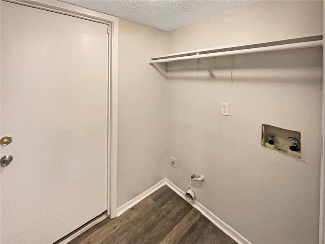 6234 Hillston Dr, Austin, TX 78745 - laundry room featuring washer hookup, dark wood-style floors, a textured ceiling, and hookup for a gas dryer