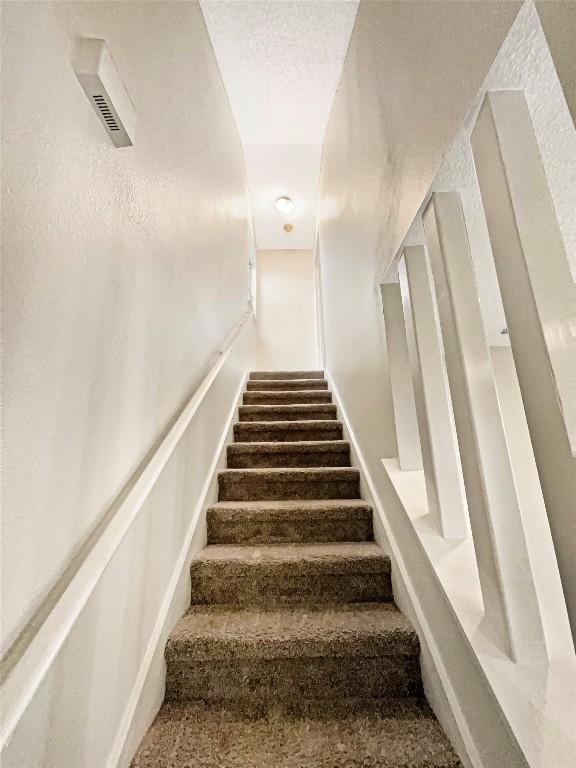 6234 Hillston Dr, Austin, TX 78745 - stairs with carpet