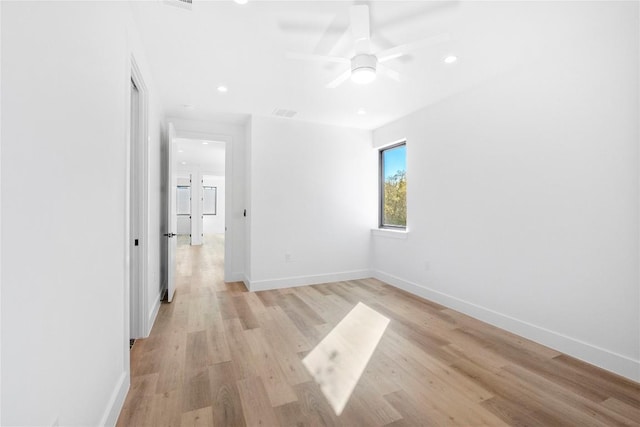 unfurnished room with light hardwood / wood-style floors and ceiling fan