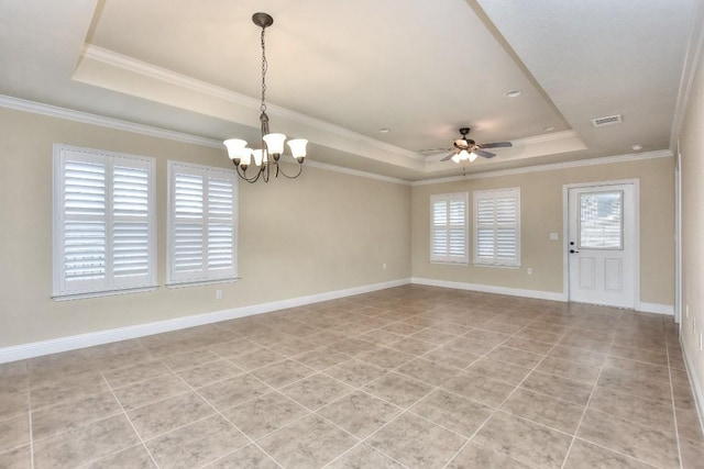 spare room with a raised ceiling, crown molding, ceiling fan with notable chandelier, and light tile patterned flooring