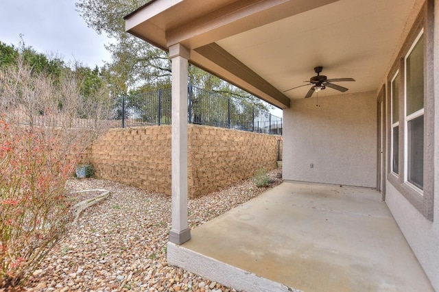 view of patio with ceiling fan