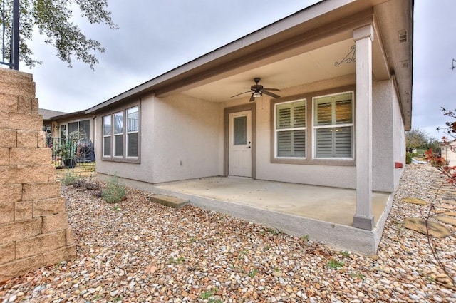 exterior space featuring a patio and ceiling fan