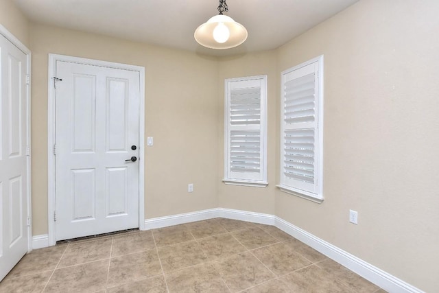 view of tiled spare room