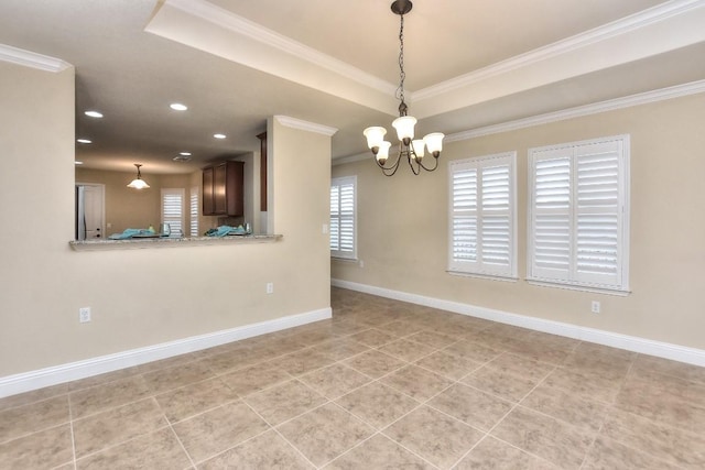 unfurnished room with crown molding, a raised ceiling, light tile patterned floors, and a notable chandelier