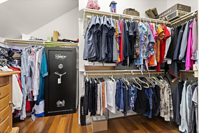 2621 Golden Gate Park, Austin, TX 78732 - walk in closet featuring dark hardwood / wood-style flooring and vaulted ceiling