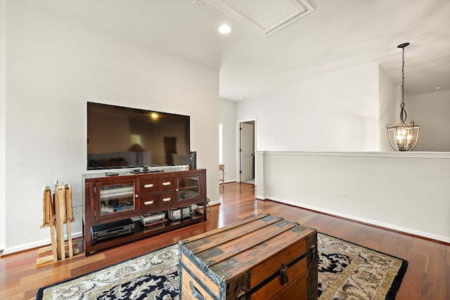 2621 Golden Gate Park, Austin, TX 78732 - living room with hardwood / wood-style floors and an inviting chandelier
