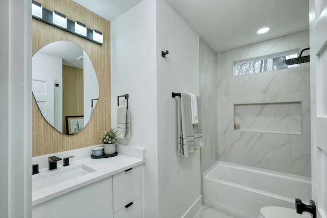 908 E 51st St, Austin, TX 78751 - bathroom featuring vanity, bathing tub / shower combination, and baseboards