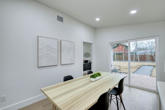 908 E 51st St, Austin, TX 78751 - dining room featuring light wood-style flooring, recessed lighting, and baseboards