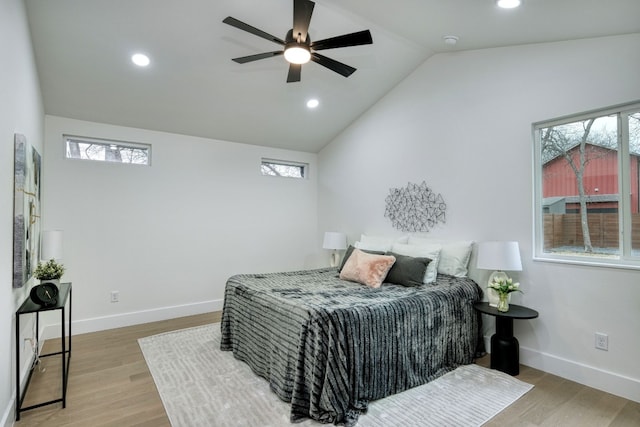 908 E 51st St, Austin, TX 78751 - bedroom featuring lofted ceiling, recessed lighting, baseboards, wood finished floors, and ceiling fan