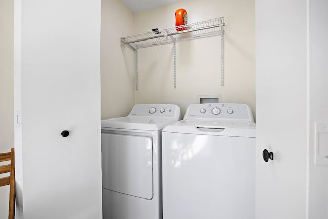 laundry area featuring washer and clothes dryer