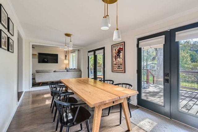 1713 Mariposa Dr, Austin, TX 78741 - dining area featuring french doors, plenty of natural light, baseboards, and wood finished floors