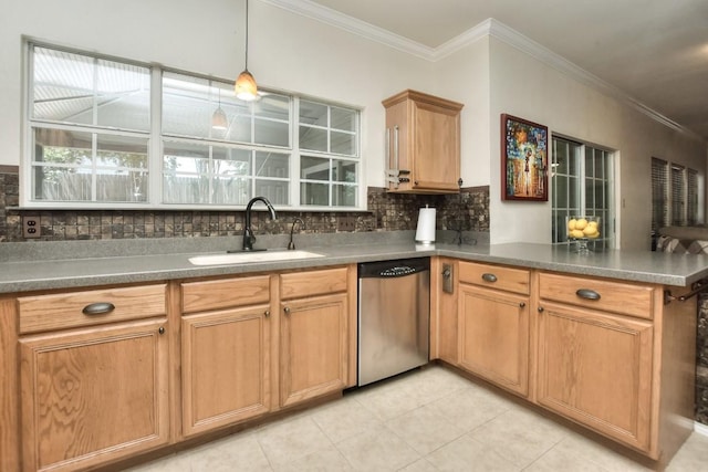 kitchen featuring sink, crown molding, backsplash, stainless steel dishwasher, and kitchen peninsula