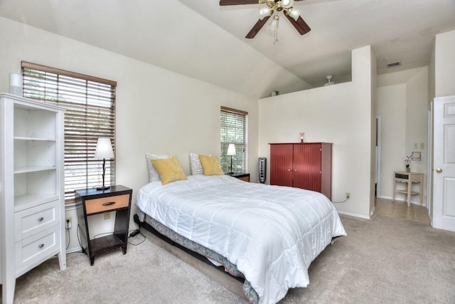 carpeted bedroom with lofted ceiling and ceiling fan