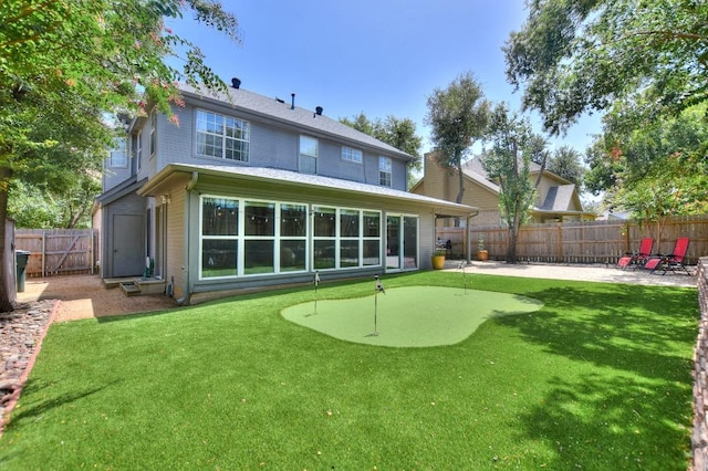 back of property with a patio area