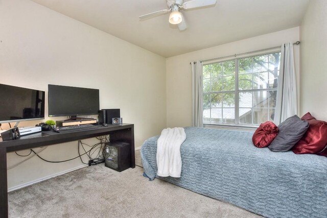 123 Parque Vista Dr, Georgetown, TX 78626 - carpeted bedroom featuring a desk and ceiling fan
