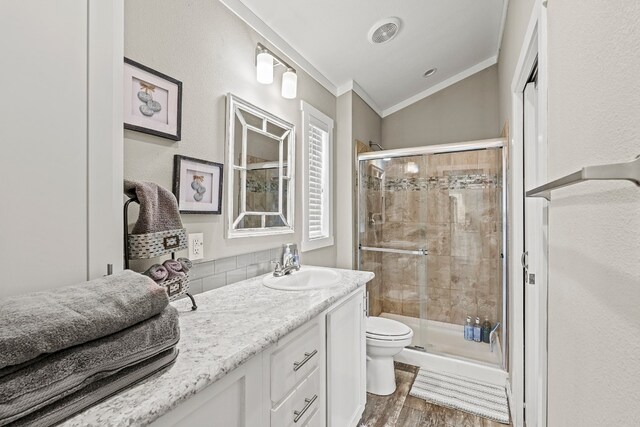 13006 Ranch Rd Unit 2341, Burnet, TX 78611 - full bath featuring ornamental molding, vanity, wood finished floors, and a shower stall