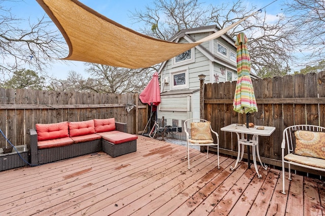 wooden terrace featuring an outdoor hangout area