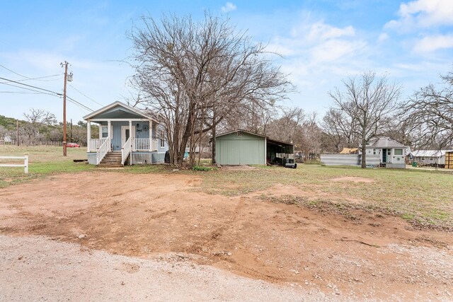 13006 Ranch Rd Unit 2341, Burnet, TX 78611 - view of front of property with a detached carport and a porch