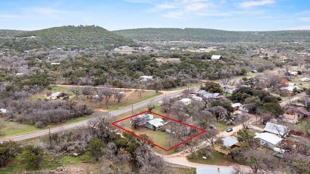 13006 Ranch Rd Unit 2341, Burnet, TX 78611 - aerial view of property's location featuring property parcel outlined and a mountain backdrop