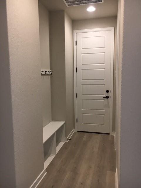 mudroom with dark wood-type flooring