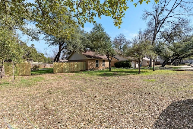 view of yard featuring fence