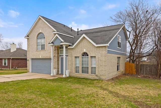 view of front facade with a garage and a front yard